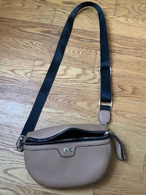 Pebble Leather Crossbody Saddle Bag in Tan with Black Adjustable Strap